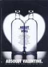 Two bottles facing each other in heart spotlight